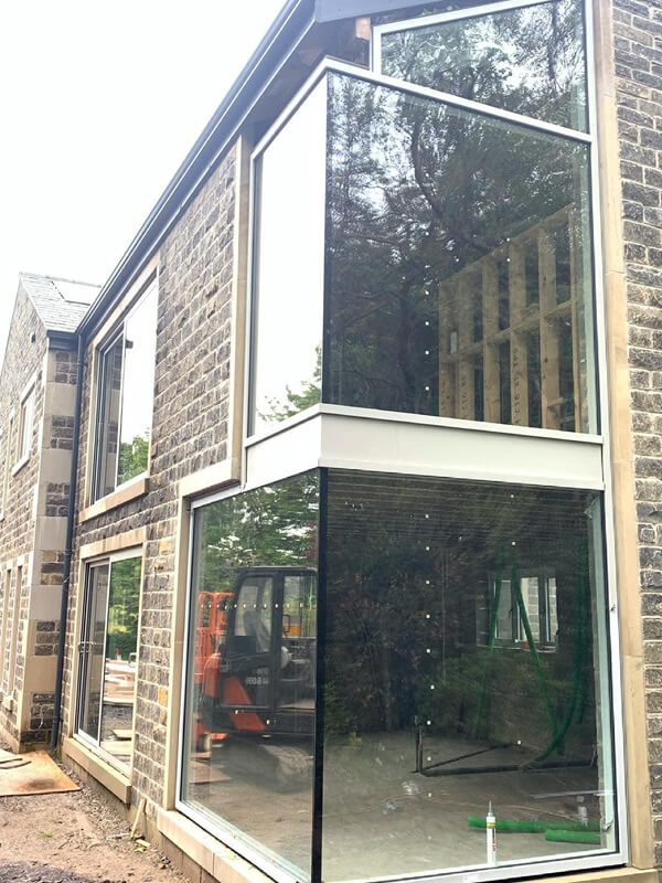 plate glass window groundfloor on new build home in Bolton